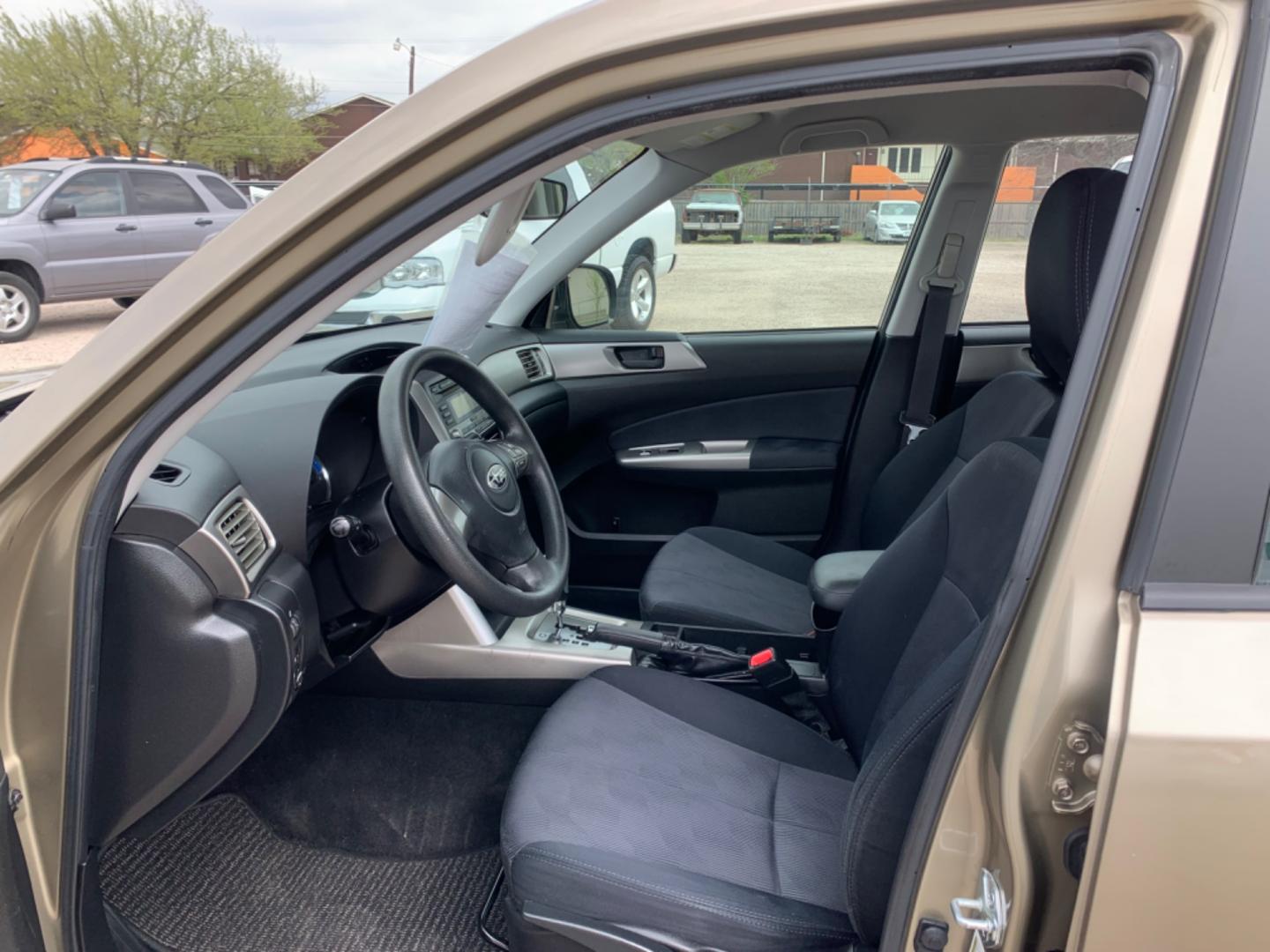 2009 Gold /Black Subaru Forester (JF2SH61649H) with an 2.5L FI SOHC 150 CID engine, AUTOMATIC transmission, located at 1830 North Belt Line Road, Irving, TX, 75061, (469) 524-0199, 32.834373, -96.993584 - Photo#5